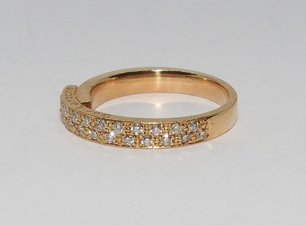 Bague "GUY LAROCHE" 24 Diamants "tailles modernes". OR Jaune 750°/°°. 4,6 gr