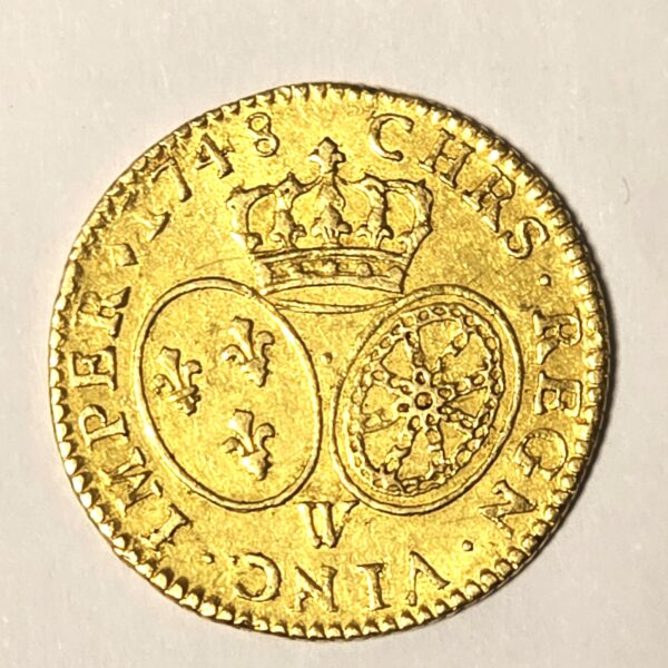 LOUIS D'OR. Louis XV Roi de France. 1748 W. Louis XV au bandeau. 8.15 grammes. SPL
